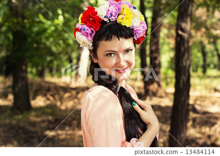 woman in wreath of roses on her head woman in wreath of roses on her head 13484114