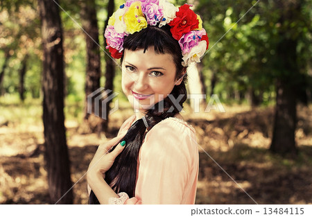 woman in wreath of roses on her head woman in wreath of roses on her head 13484115
