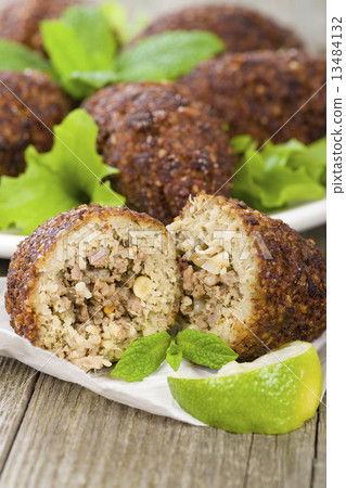 Kibbeh - Middle Eastern minced meat and bulghur fried snack Kibbeh - Middle Eastern minced meat and bulghur fried snack 13484132