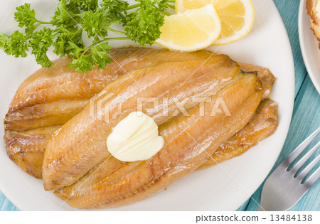 Smoked Kippers - Butterfly smoked herring served with bread.  13484138