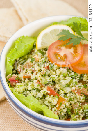 Tabbouleh - Arabic salad made with bulghur wheat  13484309