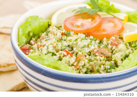 Tabbouleh - Arabic salad made with bulghur wheat  13484310