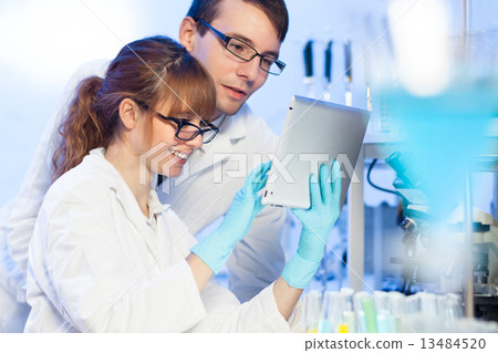 Health care professionals in lab. 13484520