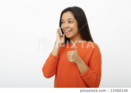 Asian women talking on mobile 13488146