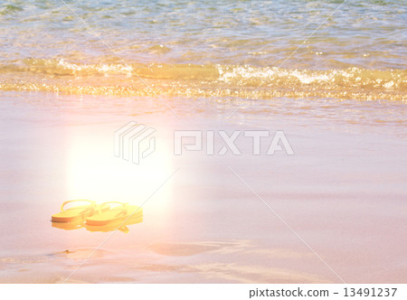 flip flops by the sea shore flip flops by the sea shore 13491237