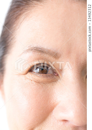 Natural makeup woman in her 50's 13492312