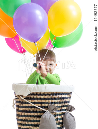 child boy on hot air balloon isolated 13492877