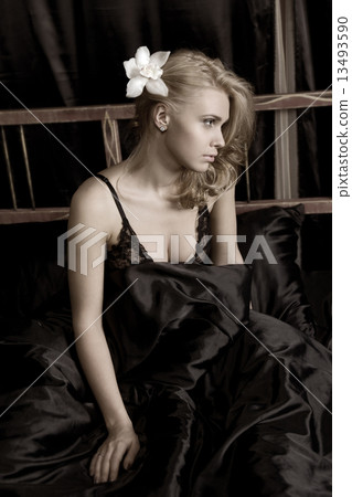 Beautiful woman with an orchid Beautiful woman with an orchid 13493590