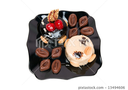 Cake with white and dark chocolate and chocolates 13494606