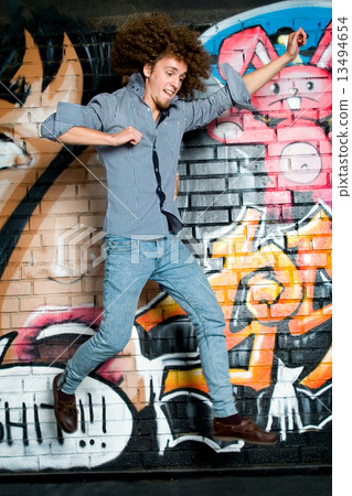 The young man with curly hair The young man with curly hair 13494654