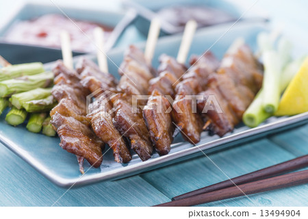 Kushiyaki - Butabara (belly pork). Japanese grilled food on skewers. Kushiyaki - Butabara (belly pork). Japanese grilled food on skewers. 13494904
