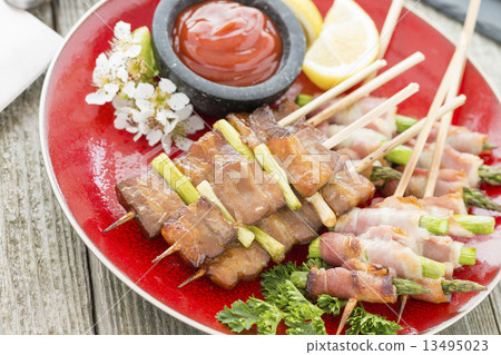Kushiyaki - Butabara (belly pork) and Asuparabekon (asparagus wrapped in bacon).  13495023