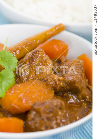 Bo Kho - Vietnamese beef stew cooked with lemongrass, star anise, bay leaf and cassia bark. Bo Kho - Vietnamese beef stew cooked with lemongrass, star anise, bay leaf and cassia bark. 13495037