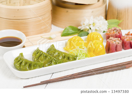 Dim Sum - Chinese colourful steamed dumplings.  13497380