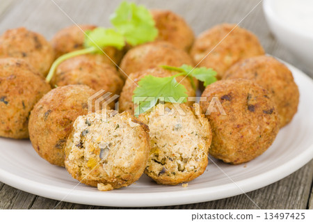 Falafel - Middle Eastern chickpea and fava beans fried balls  13497425