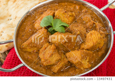 Goan Pork Vindaloo - Indian pork curry with naan bread Goan Pork Vindaloo - Indian pork curry with naan bread 13497431