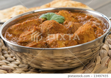 Goan Pork Vindaloo - Indian pork curry with naan bread  13497435