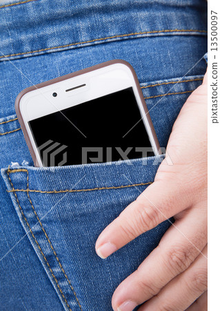 Cell phone in back pocket of girl's jeans Cell phone in back pocket of girl's jeans 13500097