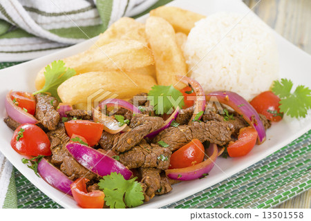 Lomo Saltado - Traditional Peruvian beef stir-fry. 13501558