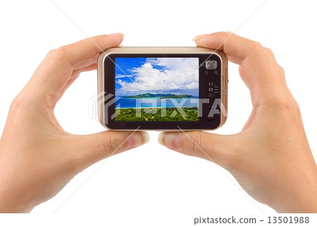 Hand with camera and beach landscape (my photo) Hand with camera and beach landscape (my photo) 13501988