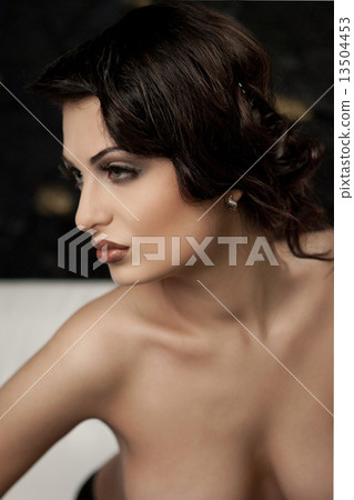 Beautiful woman with bare shoulders 13504453