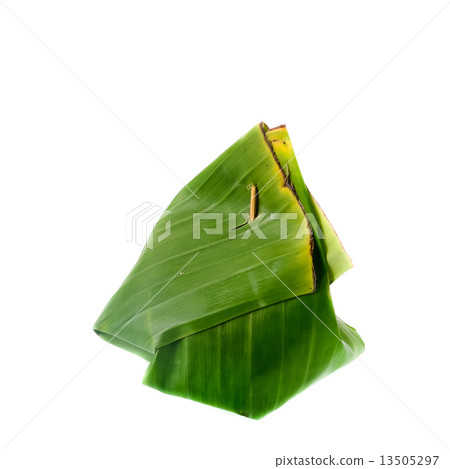 Thailand dessert wrapped in banana leaves isolated on white back Thailand dessert wrapped in banana leaves isolated on white back 13505297