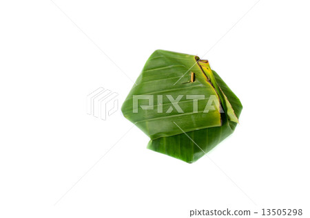 Thailand dessert wrapped in banana leaves isolated on white back 13505298