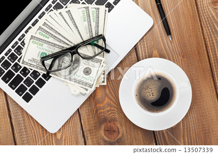 Office table with pc, supplies and money cash Office table with pc, supplies and money cash 13507339