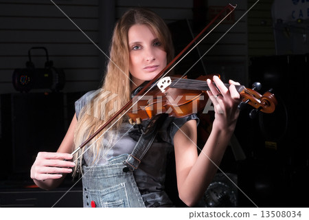 Attractive woman plays on violin Attractive woman plays on violin 13508034