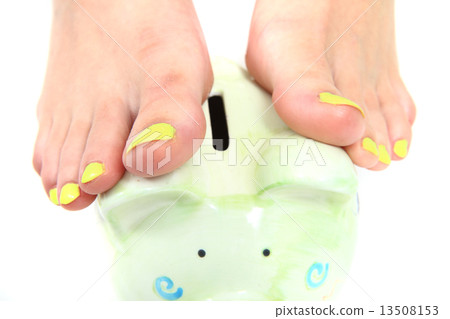women feet (pedicure)  with coin bank 13508153