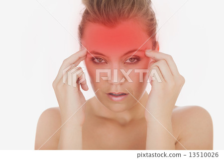 Woman massaging her temples 13510026