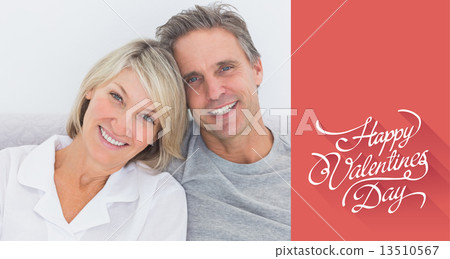 Composite image of cheerful couple in bed 13510567