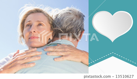 Composite image of senior woman hugging her partner 13510627
