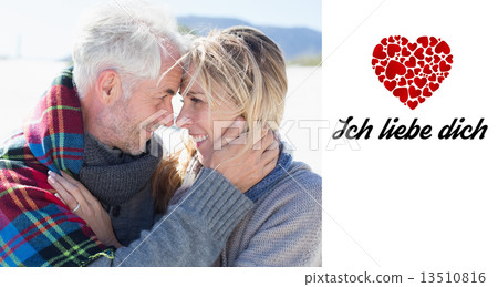 Composite image of happy married couple embracing on the beach Composite image of happy married couple embracing on the beach 13510816