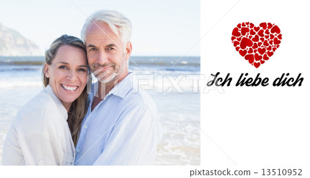 Composite image of happy couple hugging on the beach Composite image of happy couple hugging on the beach 13510952