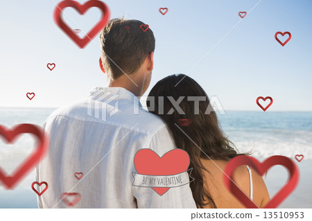 Composite image of peaceful couple looking at the ocean Composite image of peaceful couple looking at the ocean 13510953
