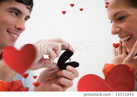 Composite image of close up of man making a proposal of marriage Composite image of close up of man making a proposal of marriage 13511843