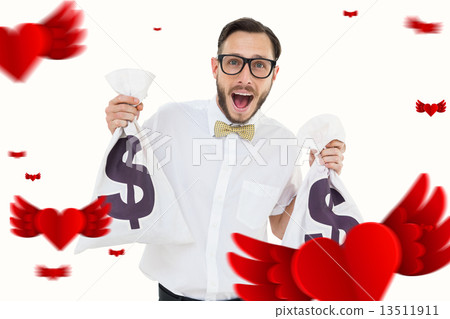 Composite image of geeky businessman holding money bags 13511911