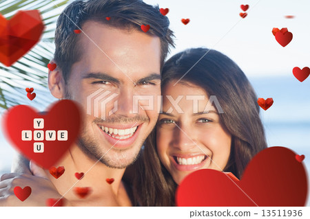 Composite image of cheerful loving couple having holidays 13511936
