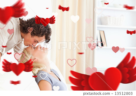 Composite image of man kissing his girlfriend on the forehead 13512803