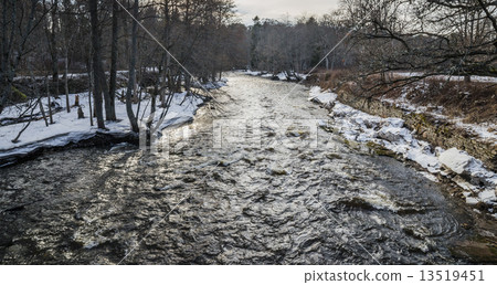 Spring landscape with a small river in flood Spring landscape with a small river in flood 13519451