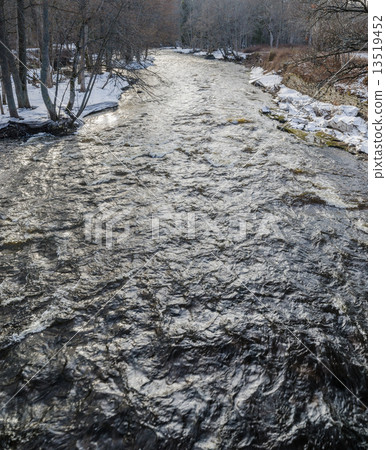 Spring landscape with a small river in flood Spring landscape with a small river in flood 13519452