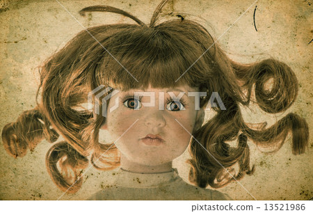 Antique doll. Vintage toy. Retro toned picture Antique doll. Vintage toy. Retro toned picture 13521986