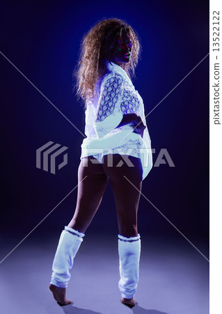 Incredible female dancer posing in neon light Incredible female dancer posing in neon light 13522122