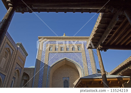 ancient courtyard of the madrasa in uzbekistan 13524219