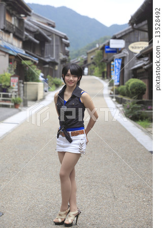 A girl posing at the post office town A girl posing at the post office town 13528492