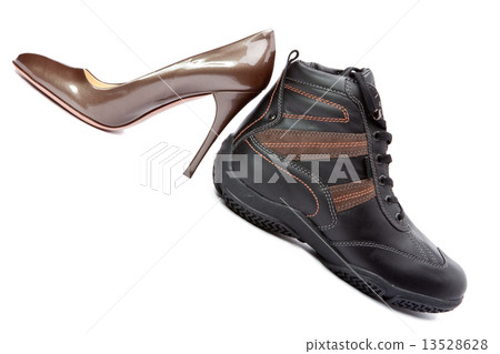Men's boots and elegant female shoes on white background Men's boots and elegant female shoes on white background 13528628