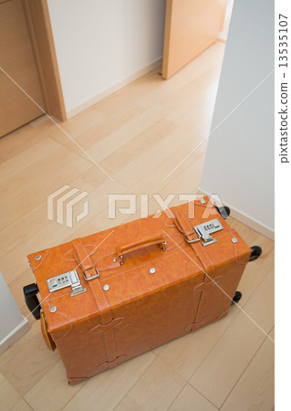 A suitcase placed in the room A suitcase placed in the room 13535107