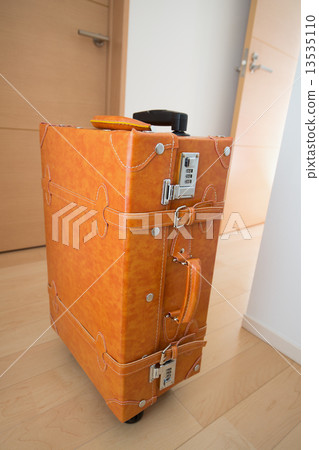 A suitcase placed in the room A suitcase placed in the room 13535110