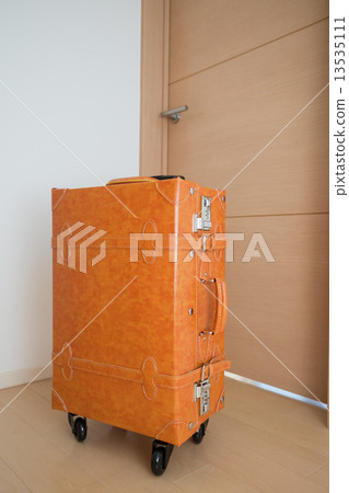 A suitcase placed in the hallway A suitcase placed in the hallway 13535111